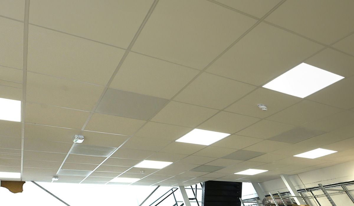 Ceiling tile heaters in warehouse office