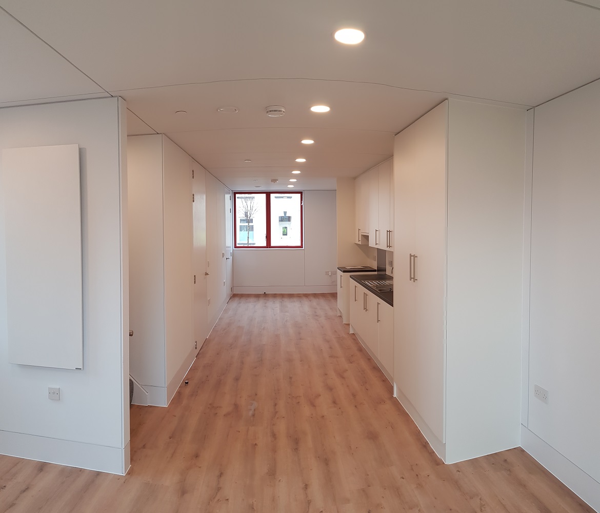 Modular homes heated by infrared as part of social housing development