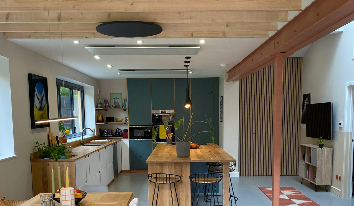 Herschel Select XLS Round and White Panel heaters installed on ceiling