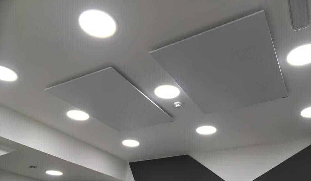 Herschel White ceiling mounted panels heating an office reception space