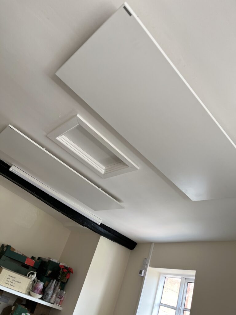 Comfort infrared panel heaters installed in pottery studio