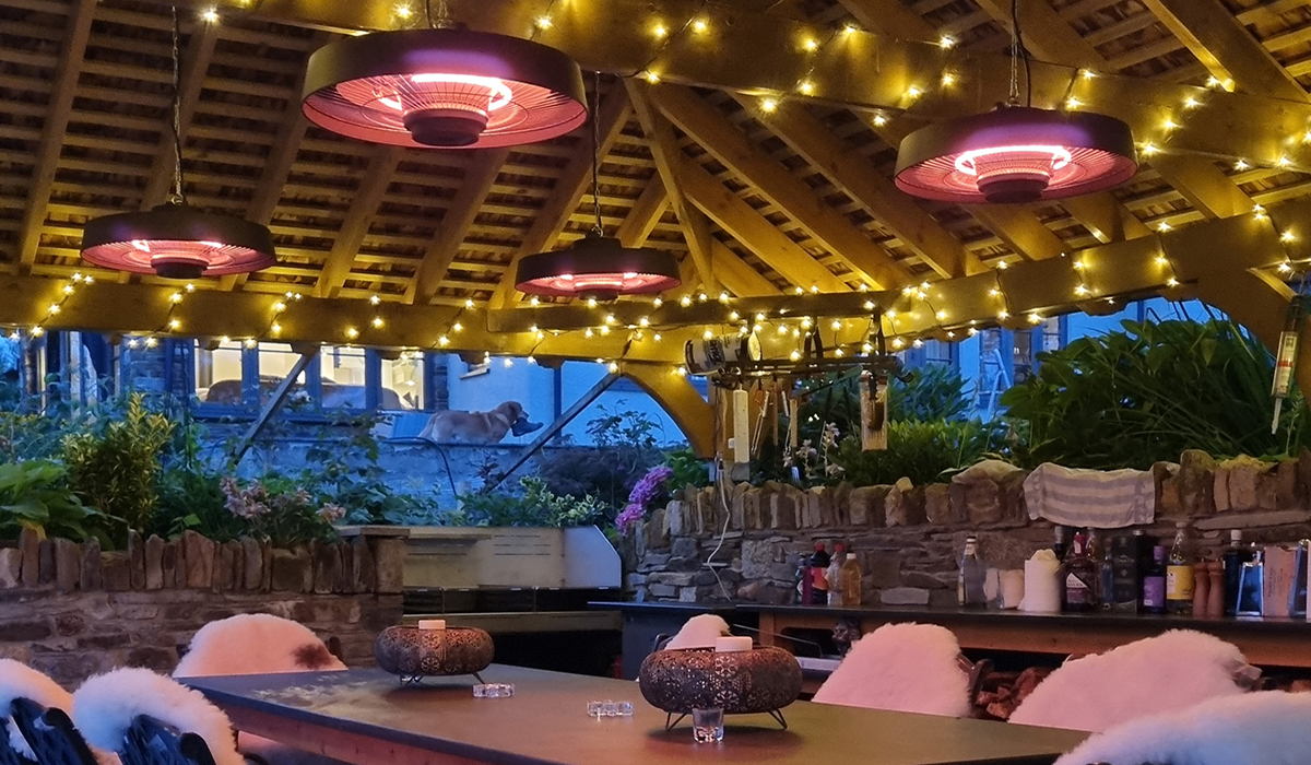 Hawaii hanging patio heater installed in outdoor covered area