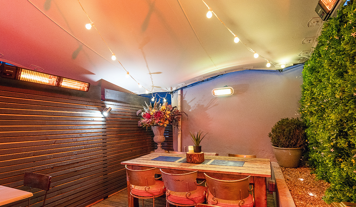 Manhattan commercial patio heaters installed in outdoor bar area
