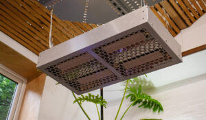 Herschel Power 4 heater in silver heating a hot yoga studio