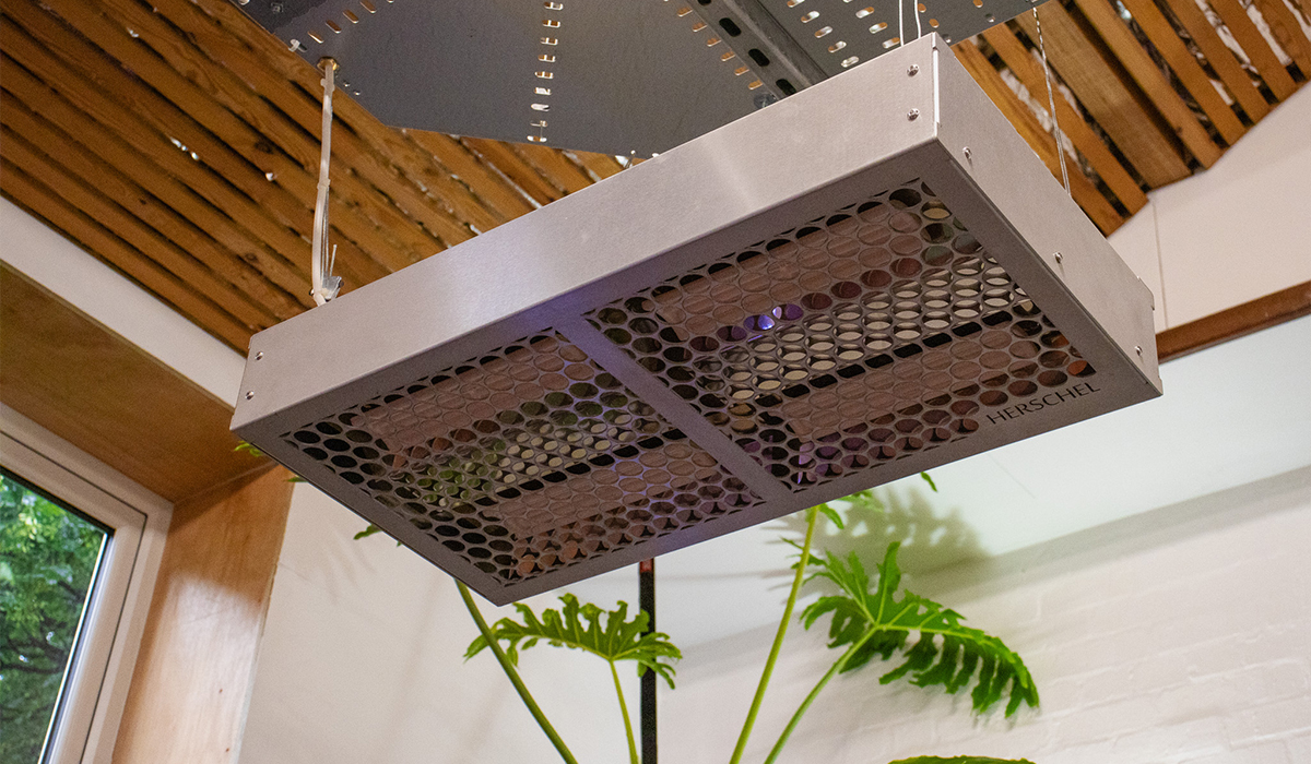 Herschel Power 4 heater in silver heating a hot yoga studio