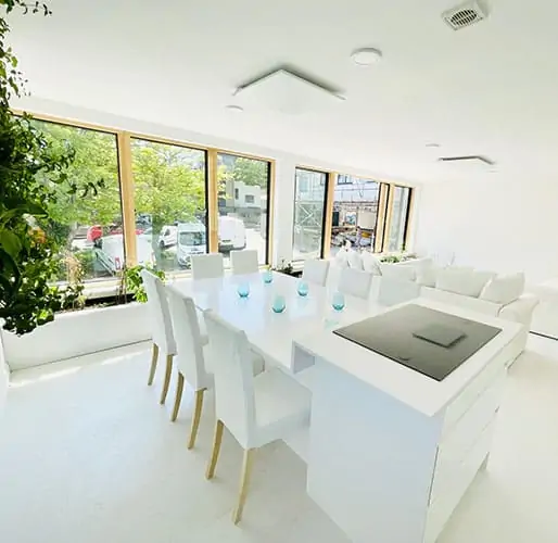 Herschel white frameless ceiling mounted XLS panels in open plan kitchen and living area