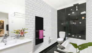Select XLS Towel heater with a black finish