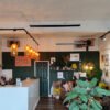 Herschel Black summit in coffee shop and plant shop