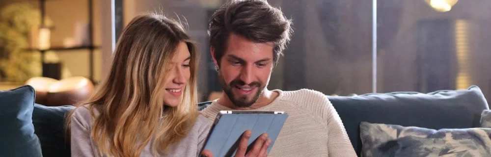 Couple controlling Herschel XLS on their iPad