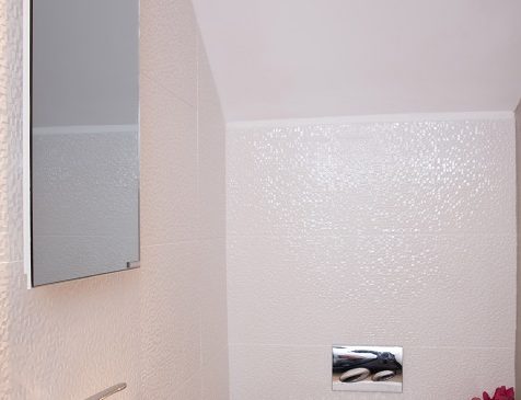 Space saving mirror heater for smaller bathrooms