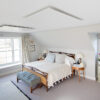 Ceiling mounted infrared panels in bedroom