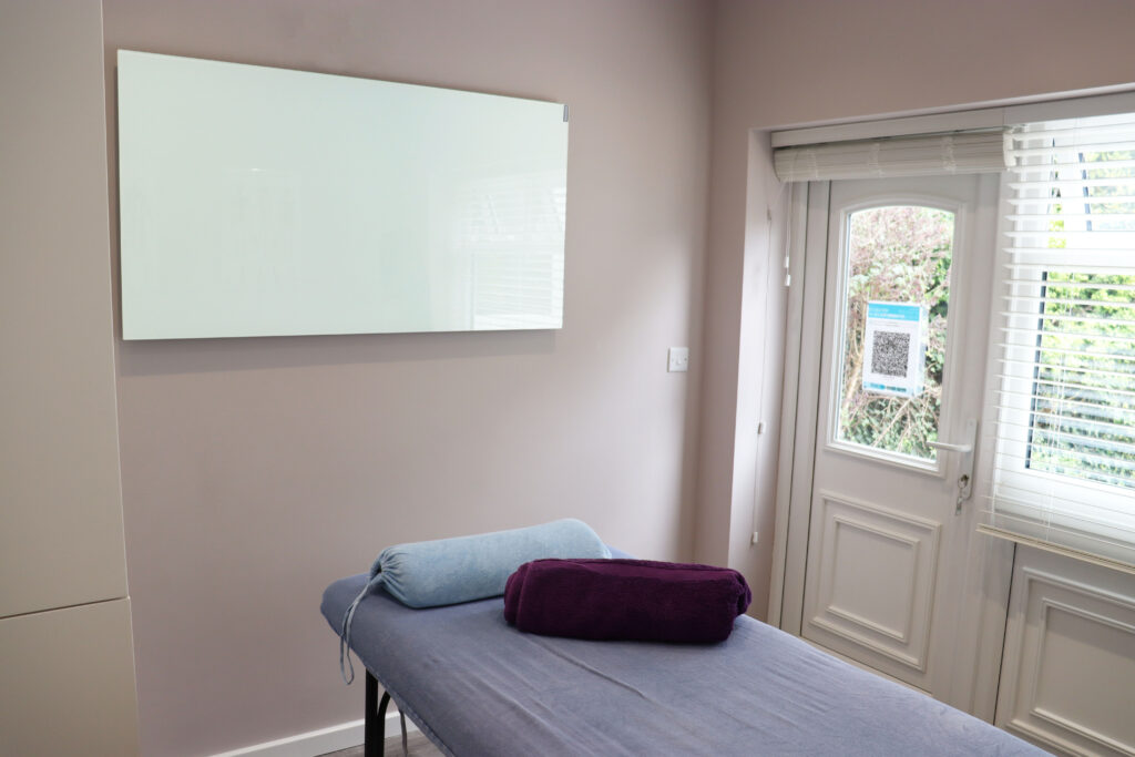 Inspire white glass heating a therapy room