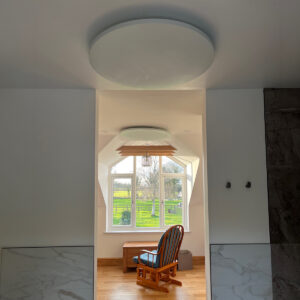 Select XLS Round - White panels ceiling-mounted in home living space 1200x1200