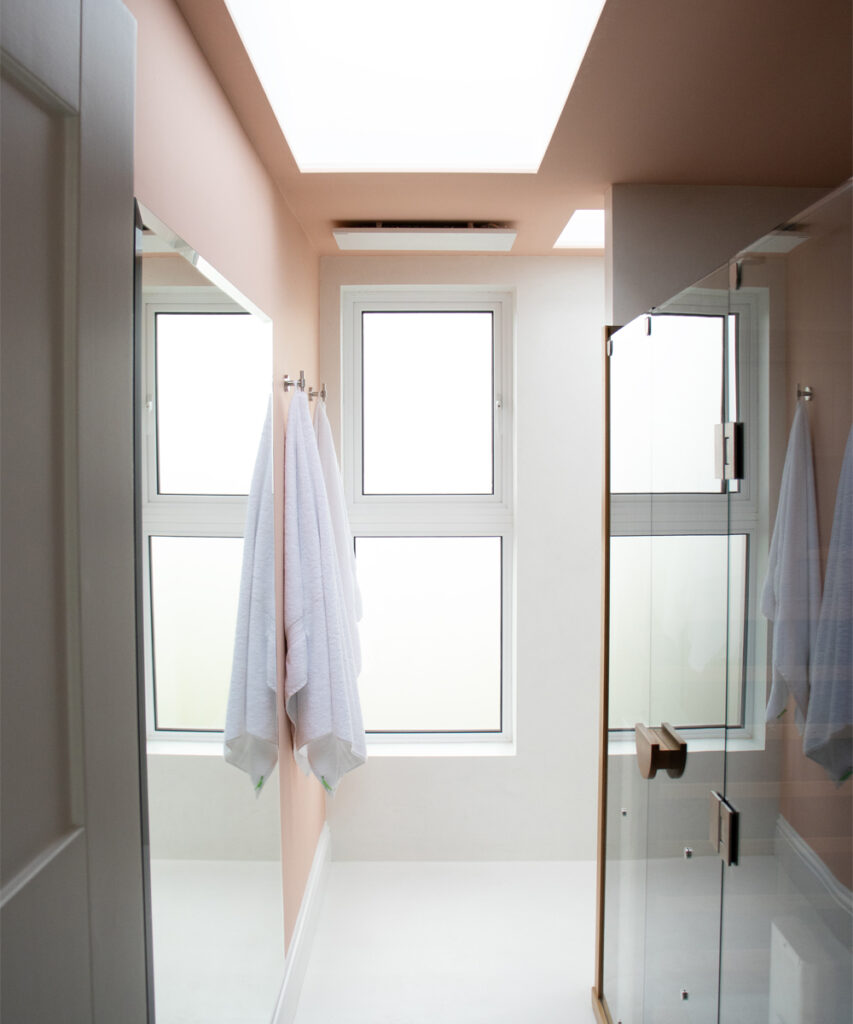 Comfort heating panels from Herschel keep the hallway light and airy, delivering unobtrusive warmth 