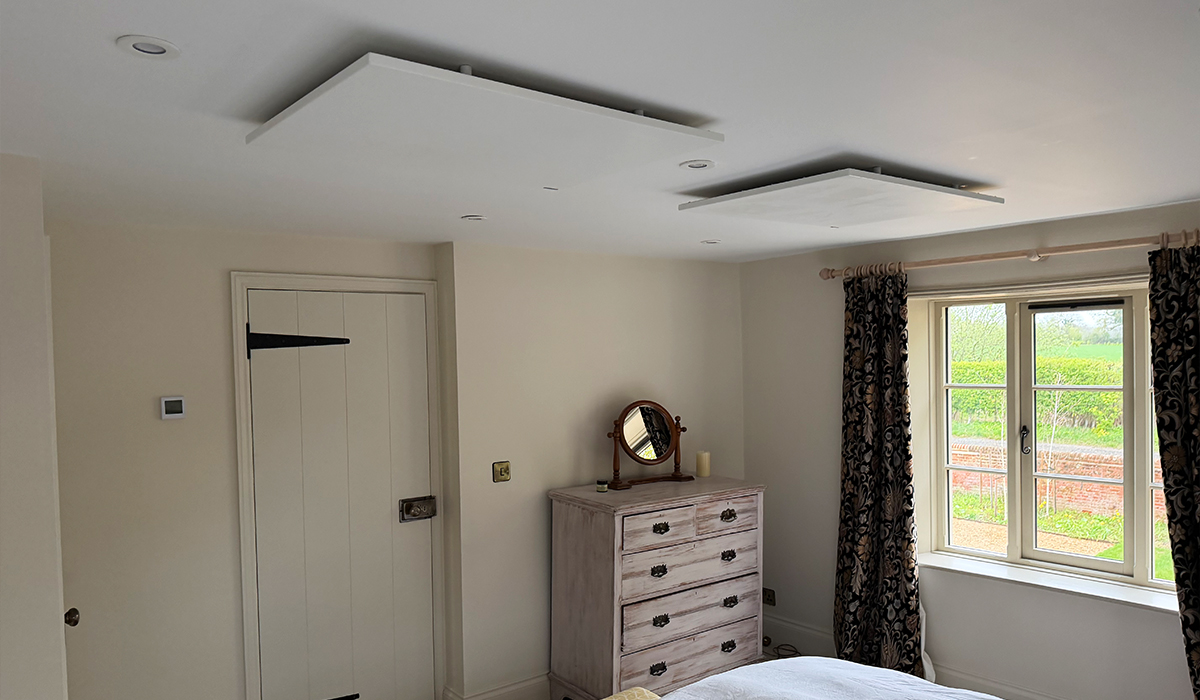 Comfort panels heaters installed on ceiling in bedroom